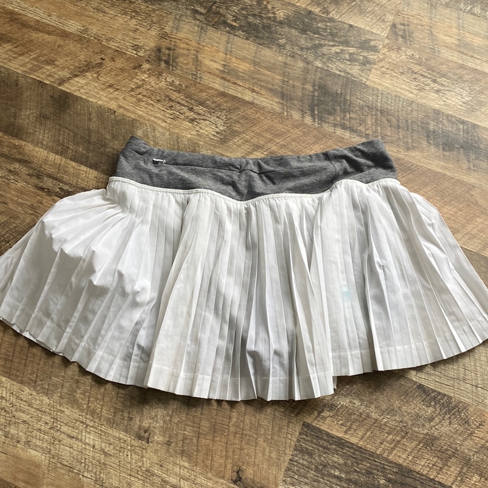 White skirt with shorts and pockets.For athletics